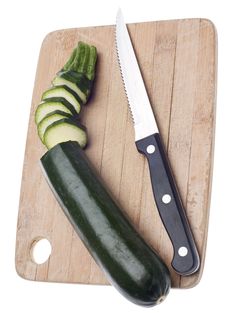 Sliced Zucchini On A Wooden Chopping Block Royalty Free Stock Images Sliced Zucchini On A Wooden Chopping Block Royalty Free Stock Images