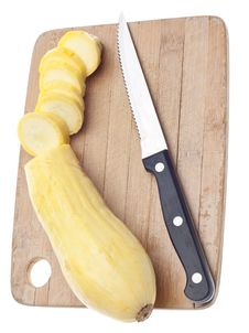 Sliced Yellow Squash On A Wooden Chopping Block Royalty Free Stock Photography Sliced Yellow Squash On A Wooden Chopping Block Royalty Free Stock Photography