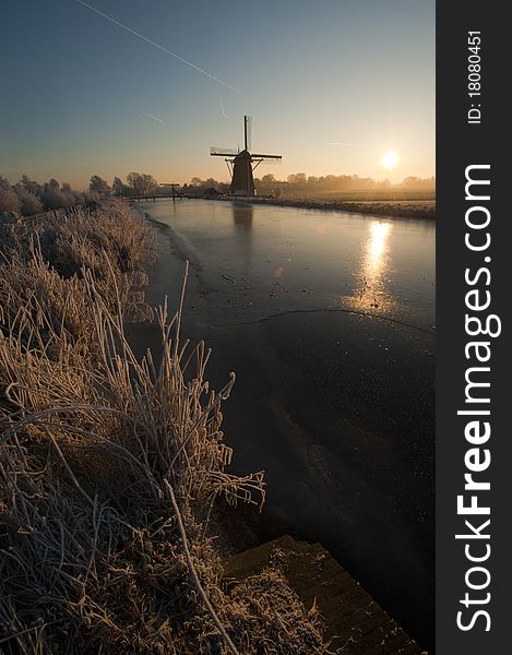 Old Windmill along frozen river