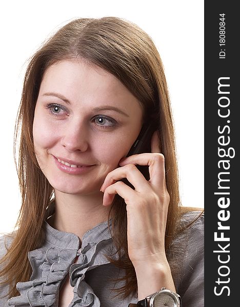 Young adult woman on call with a cell phone portrait