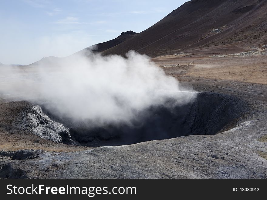 Volcanic landscape at Iceland with boiling mud in Iceland. Volcanic landscape at Iceland with boiling mud in Iceland