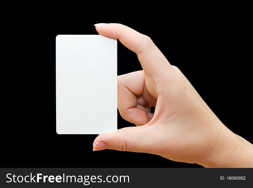 Paper card in woman hand on black background
