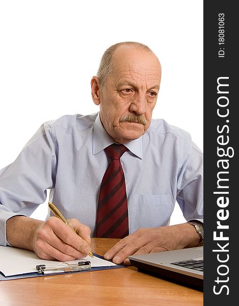 Businessman at the computer isolated on white background