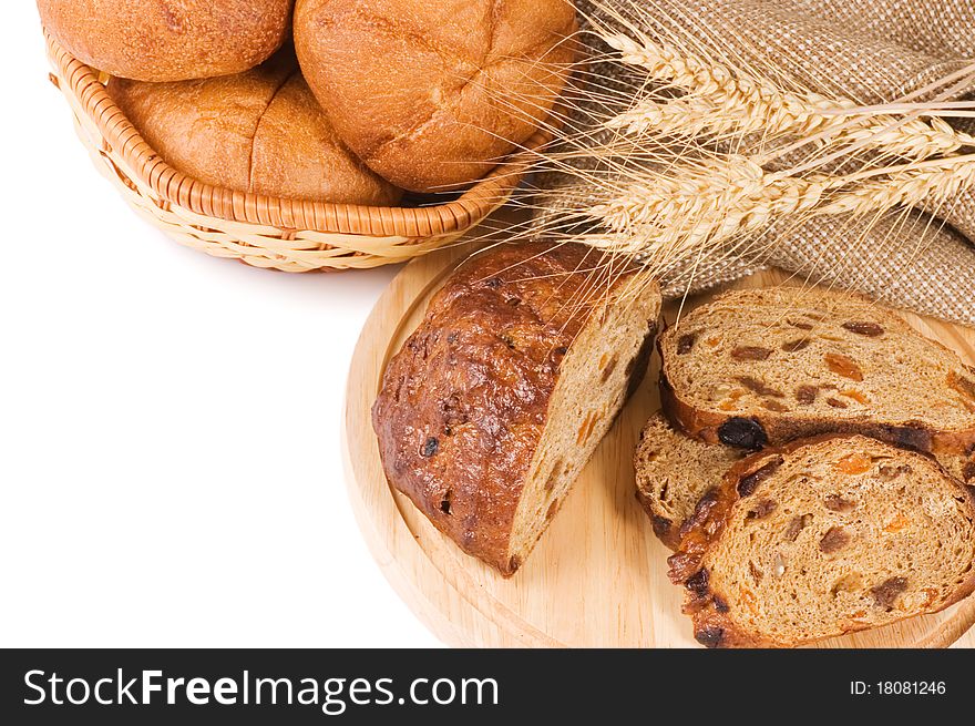 Fresh bread with ear of wheat still life