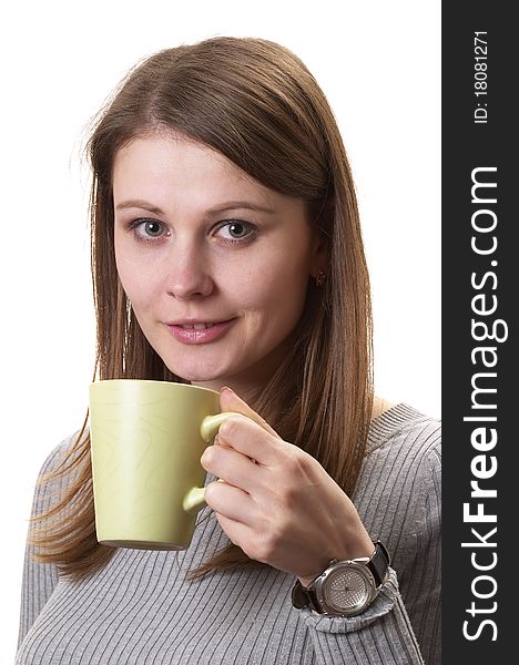 Young woman with green cup in the hands isolated over white background. Young woman with green cup in the hands isolated over white background