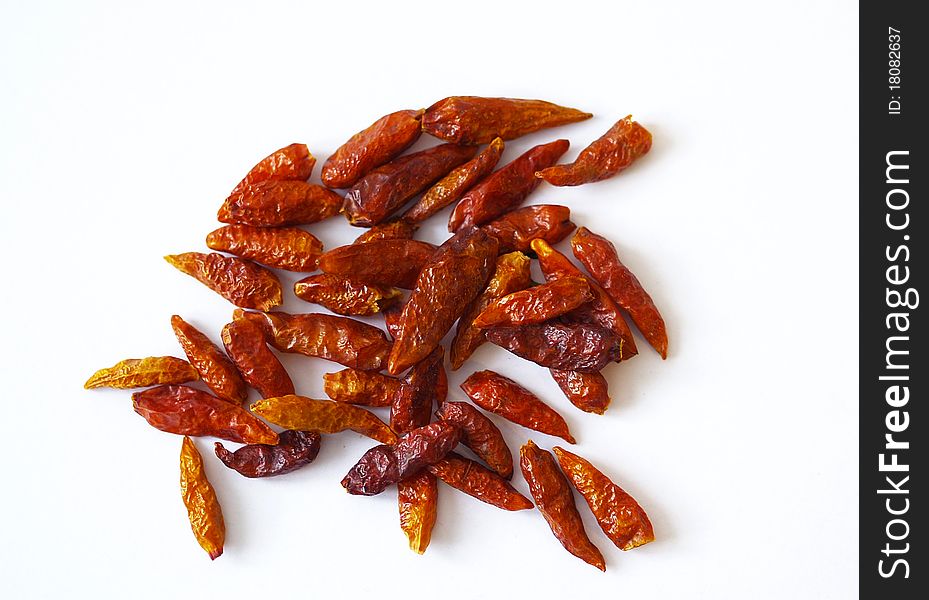 Red dried-up chili's isolated on white background. Red dried-up chili's isolated on white background.