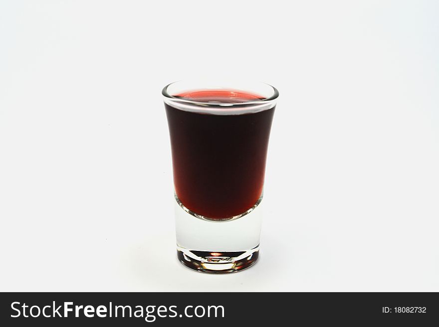 Glass of red wine isolated on a white background