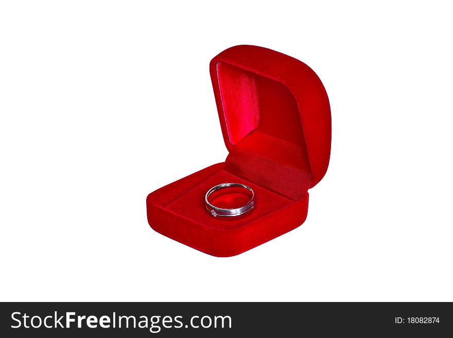 Ring in open red velvet box isolated on white background