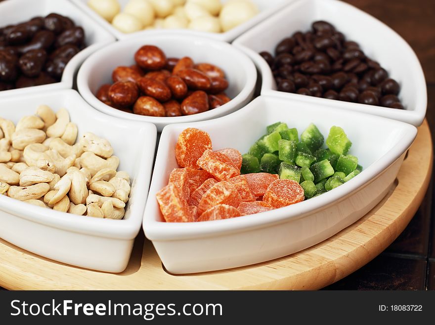 Dried fruit and nuts in chocolate in the bowl prepared for party