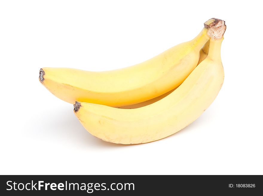 A bunch of yellow bananas isolated on white. A bunch of yellow bananas isolated on white.