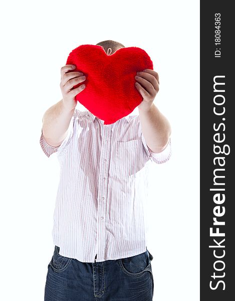 Man with red plush heart on white background. Man with red plush heart on white background