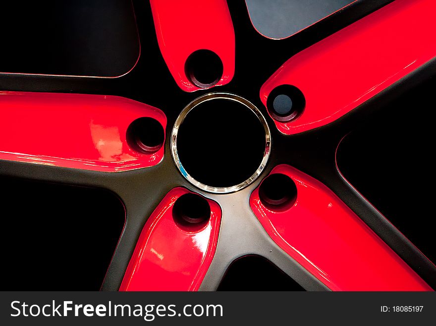 Red Metallic tyre disc of a sport car