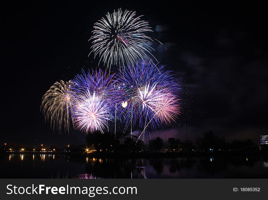 Bright and colorful fireworks exploding in the night sky. Bright and colorful fireworks exploding in the night sky