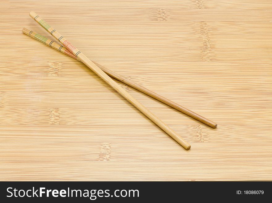 A pair of wooden chopsticks