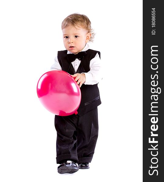 Baby boy in age one year holding balloon isolated