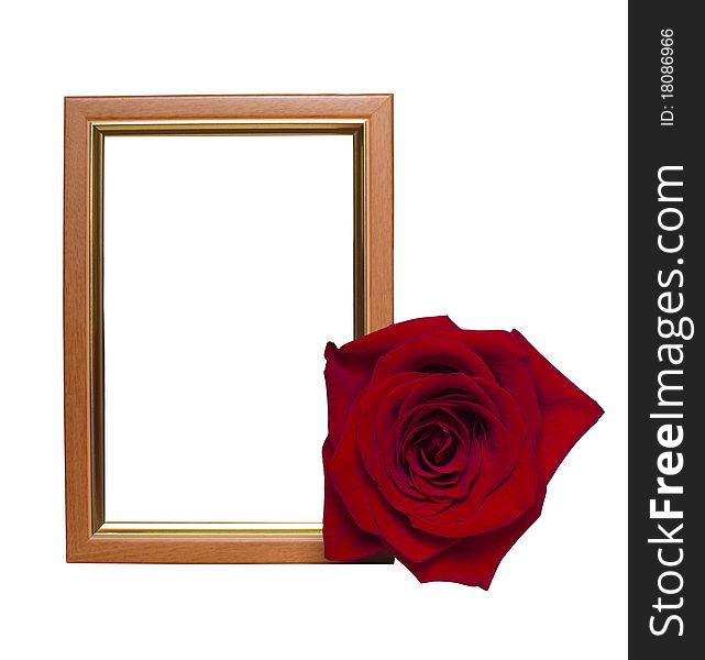 Isolated wooden empty frame with a red rose. Isolated wooden empty frame with a red rose