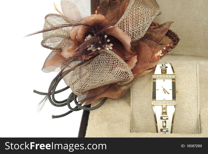 Woman watch in open box on a white background. Woman watch in open box on a white background