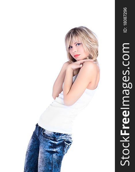 Young girl in jeans over white background