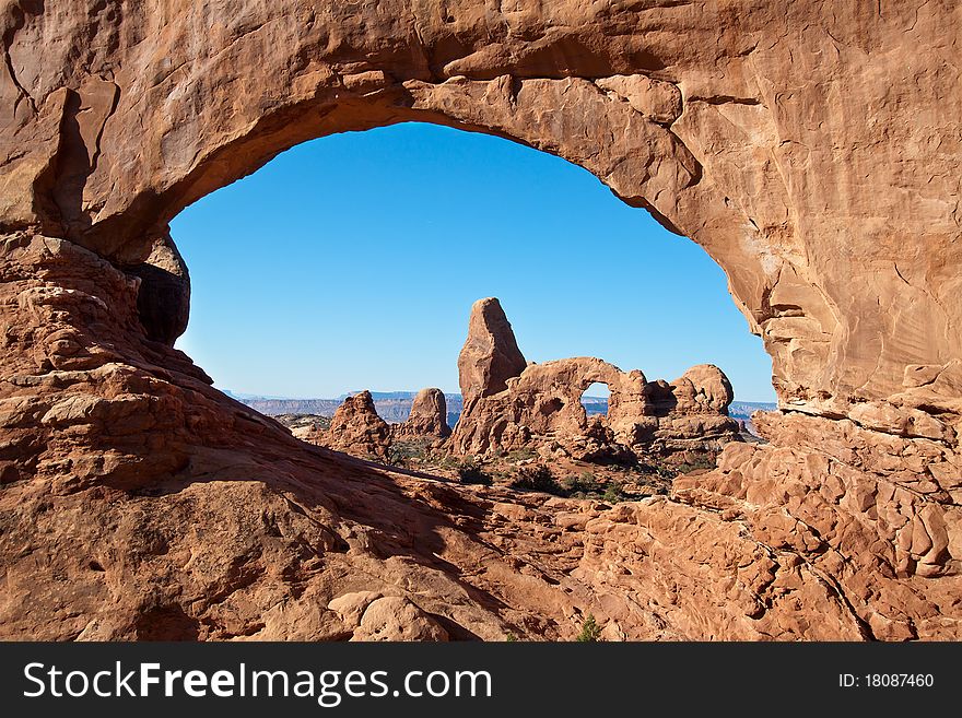 Turret Arch framed by North Window in the Arches National Park, Utah. Turret Arch framed by North Window in the Arches National Park, Utah