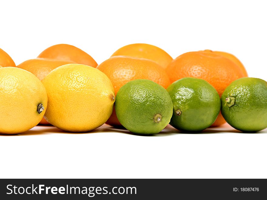 Whole oranges, lemons, limes - isolated on white