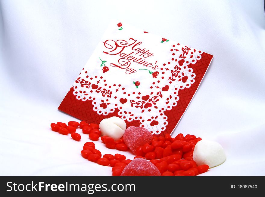 Happy Valentines greetings with red and white candy