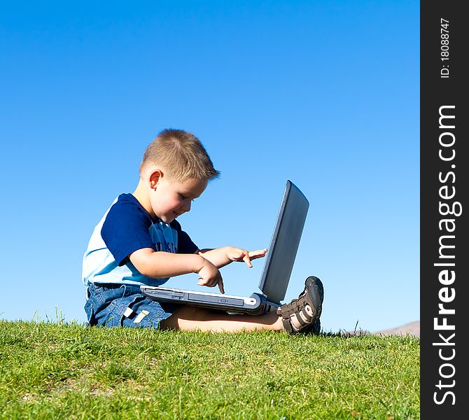 Little boy with laptop