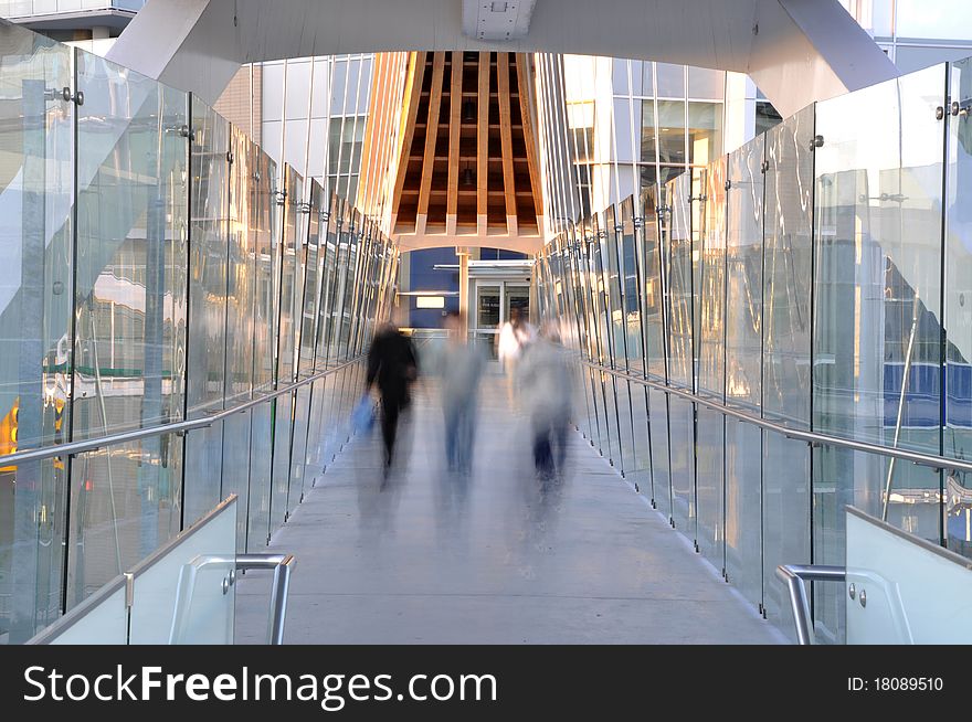 Commerce and pedestrian bridge with motion people