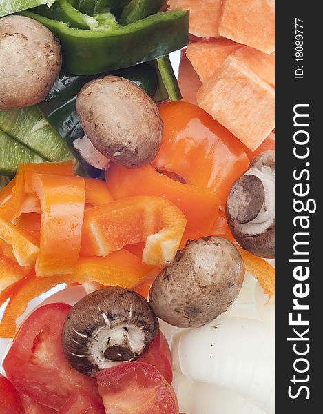 Variety of Vegetables Mushroom, Pepper, Onion, Tomato, and Sweet Potato Background.