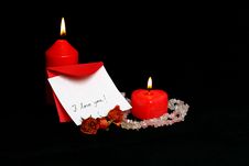 Love Message With Burning Red Candles Stock Photography