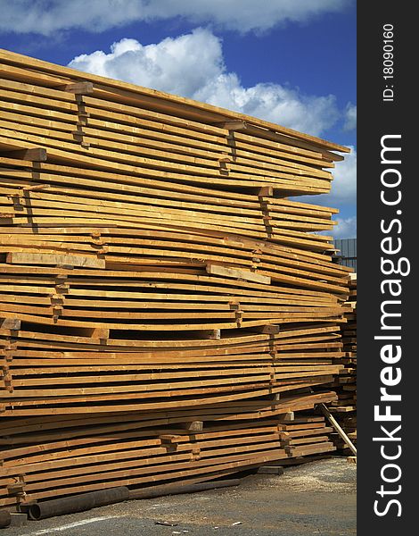 Wooden boards for construction at Russian building materials shop. Wooden boards for construction at Russian building materials shop