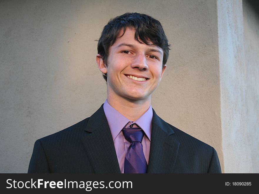 Young man dressed in suit and tie. Young man dressed in suit and tie.