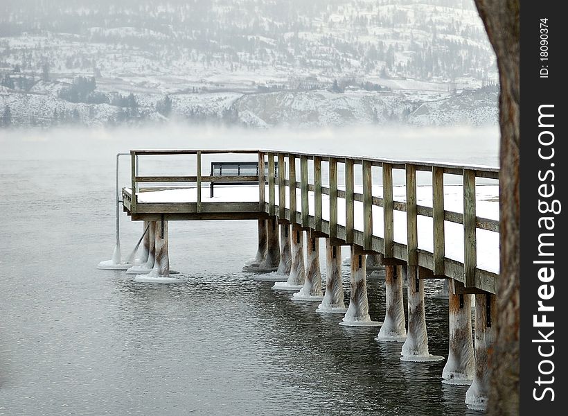 Frozen pier on lake in winter. Frozen pier on lake in winter