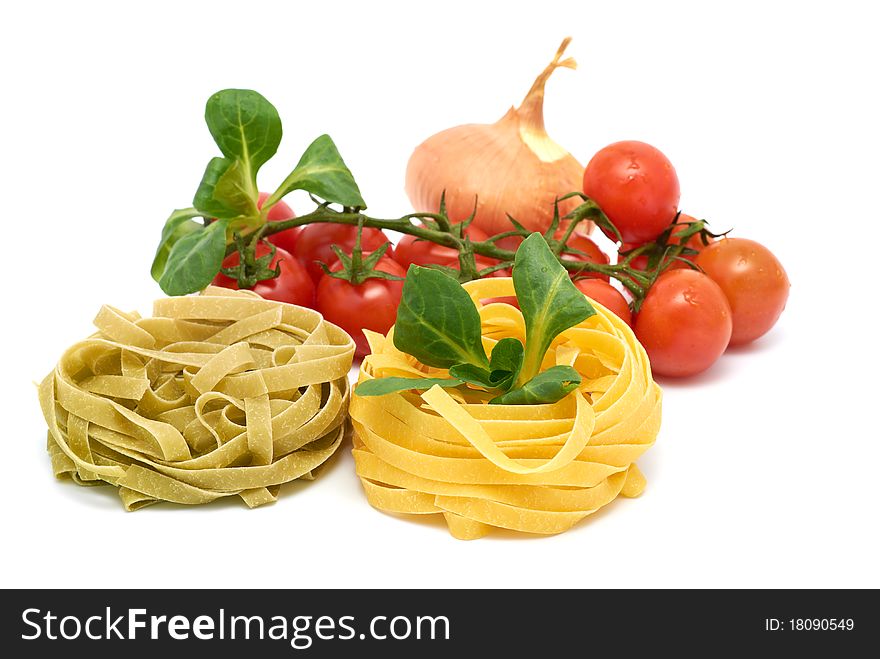 Italian pasta tagliatelle with vegetables on a white background