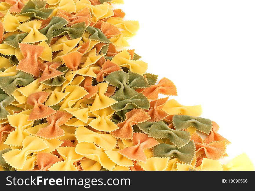 Italian pasta farfalle on a white background