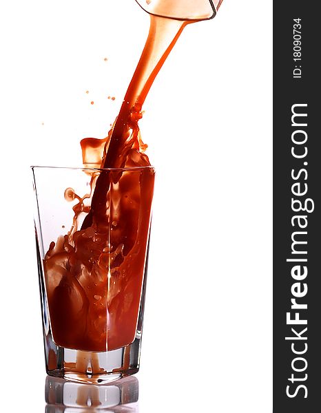 Tomato juice splash in glass white background