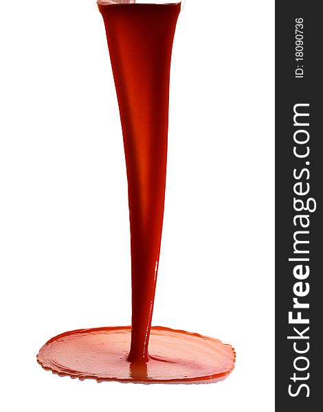 Tomato juice splash in glass white background