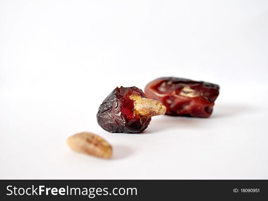 Picture of dried dates on isolated white background
