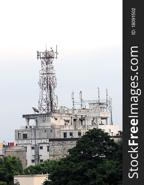 Top of a telecommunication tower on an overcast day. Top of a telecommunication tower on an overcast day