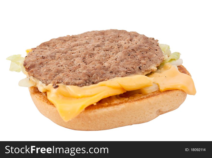 A cheeseburger patty on a white background