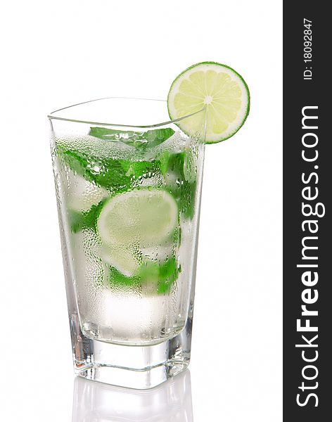 Classic Mojito Cocktail drink with light rum, lime, spring of mint, sprite soda and syrup in cocktails highball glass isolated on a white background