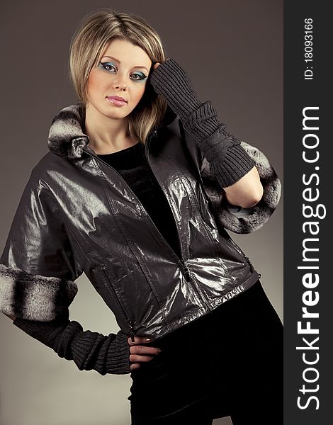 young woman in leather jacket