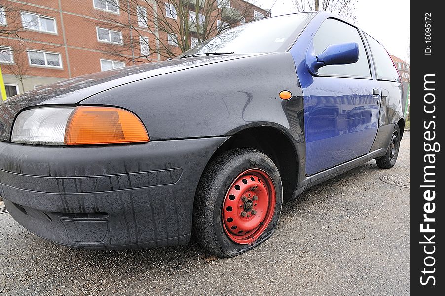 Car with flat tires on roadside. Car with flat tires on roadside