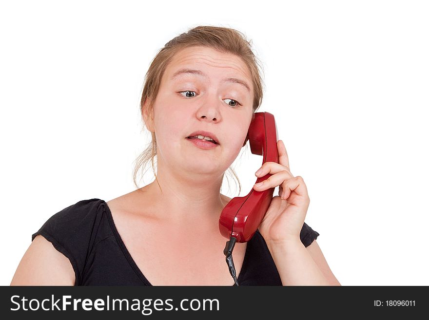Young woman talking on the phone - isolated. Young woman talking on the phone - isolated
