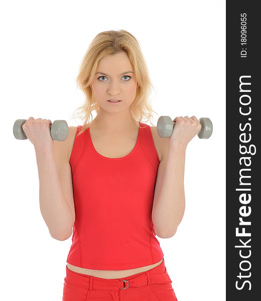 Fitness woman working out with free weights