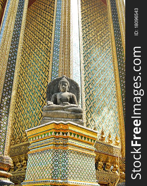 Stone Buddha Statue in Grand Palace , Thailand , Also know as Wat Phra Kaew , The most famous temple in the world. Stone Buddha Statue in Grand Palace , Thailand , Also know as Wat Phra Kaew , The most famous temple in the world.