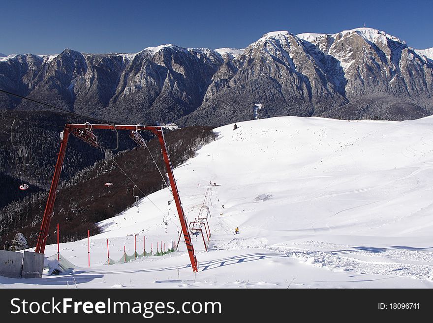 General view of a ski slope and a ski lift. General view of a ski slope and a ski lift