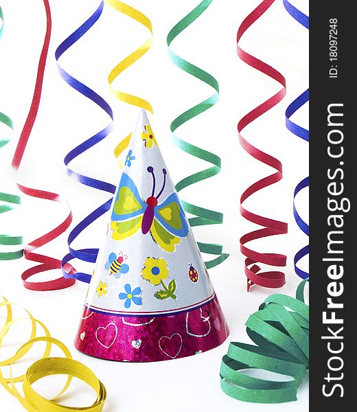 Hats and colorfull ribbons for kid's party, isolated on white background. Hats and colorfull ribbons for kid's party, isolated on white background