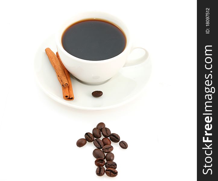 White coffee cup and pointing arrow made of coffee beans isolated on white. White coffee cup and pointing arrow made of coffee beans isolated on white