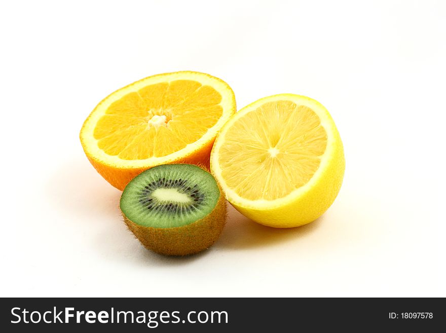 Group of 3 exotic fruits (orange, lemon, kiwi) sliced in half, isolated on white. Group of 3 exotic fruits (orange, lemon, kiwi) sliced in half, isolated on white