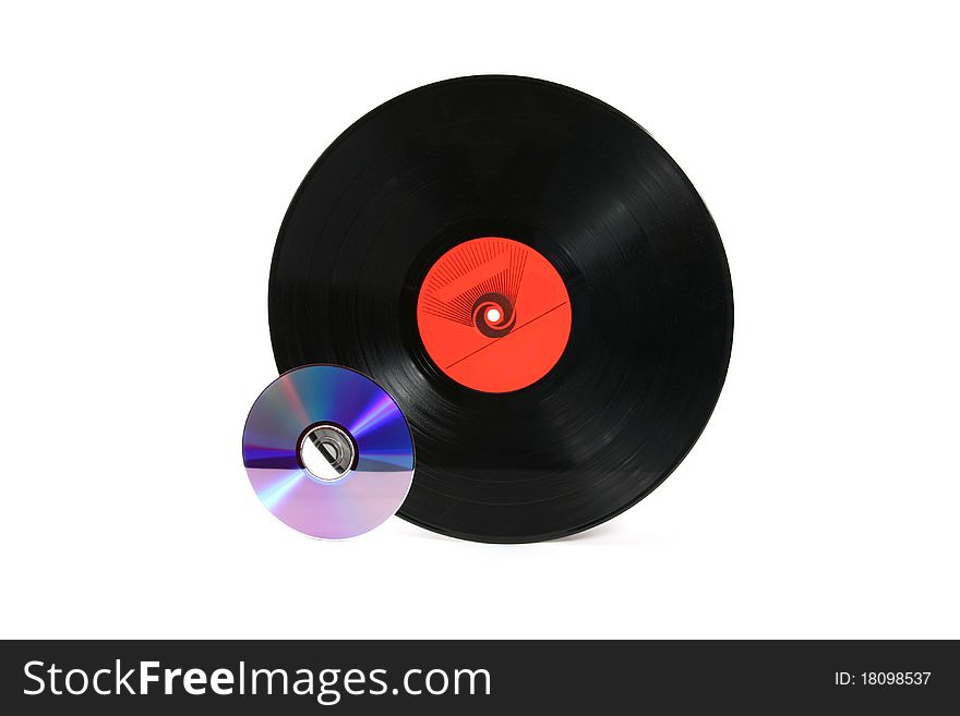 Old vinyl record and cd isolated on white background